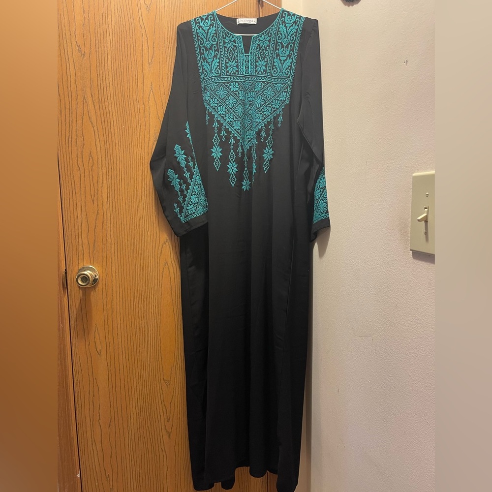 New turquoise Abaya from Turkey. Only worn once. Size XL. Selling for $30.